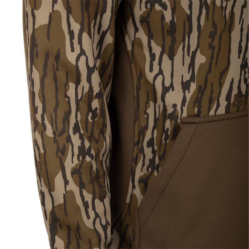 MST Endurance Hoodie With Kangaroo Pouch, featuring a vertical Magnattach™ chest pocket, zippered lower pockets, and a fleece-lined hood, shown in a close-up view.