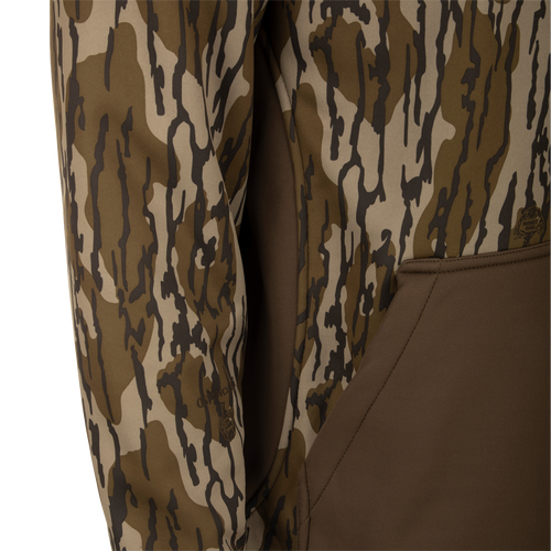 MST Endurance Hoodie With Kangaroo Pouch, featuring a vertical Magnattach™ chest pocket, zippered lower pockets, and a fleece-lined hood, shown in a close-up view.