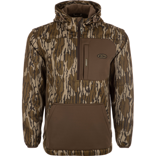 MST Endurance Hoodie With Kangaroo Pouch, featuring a camouflage pattern, vertical Magnattach™ chest pocket, zippered lower pockets, and an adjustable fleece-lined hood.