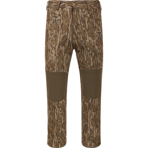 Endurance Jean Cut Wader Pant featuring camouflage pattern, front slash pockets, rear pockets, and adjustable waist, designed for comfort and protection in mid-season hunting.