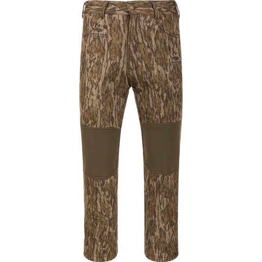 Endurance Jean Cut Wader Pant featuring camouflage pattern, front slash pockets, rear pockets, and adjustable waist, designed for comfort and protection in mid-season hunting.