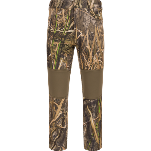 Endurance Jean Cut Wader Pant with camouflage pattern, featuring front slash pockets, rear pockets, and adjustable waist for hunting comfort and protection.