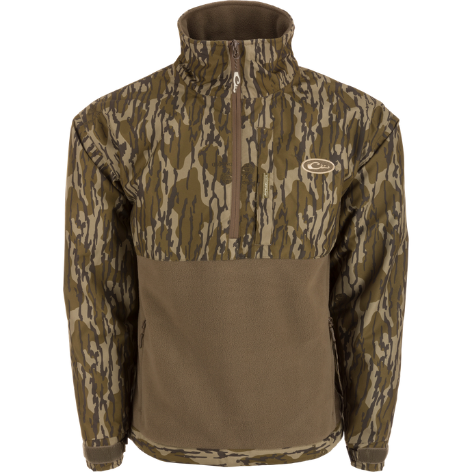 MST Half Zip Eqwader Jacket featuring waterproof sleeves, ultra-breathable fleece lower body, and multiple zippered pockets, designed for waterfowl hunting comfort and performance.