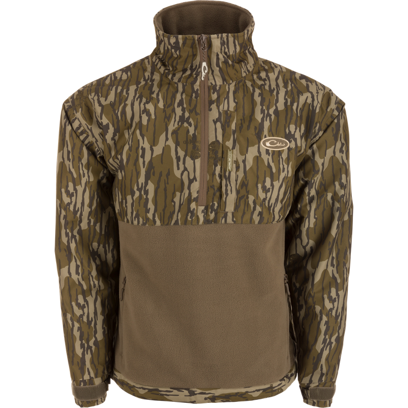 MST Half Zip Eqwader Jacket featuring waterproof sleeves, ultra-breathable fleece lower body, and multiple zippered pockets, designed for waterfowl hunting comfort and performance.