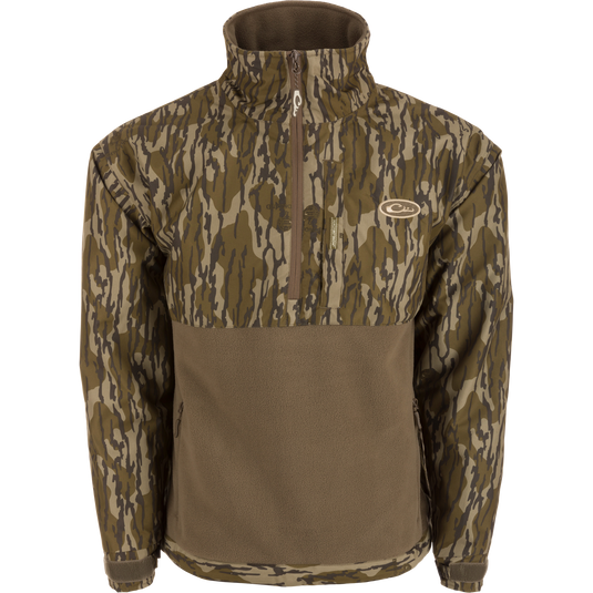 MST Half Zip Eqwader Jacket featuring waterproof sleeves, ultra-breathable fleece lower body, and multiple zippered pockets, designed for waterfowl hunting comfort and performance.