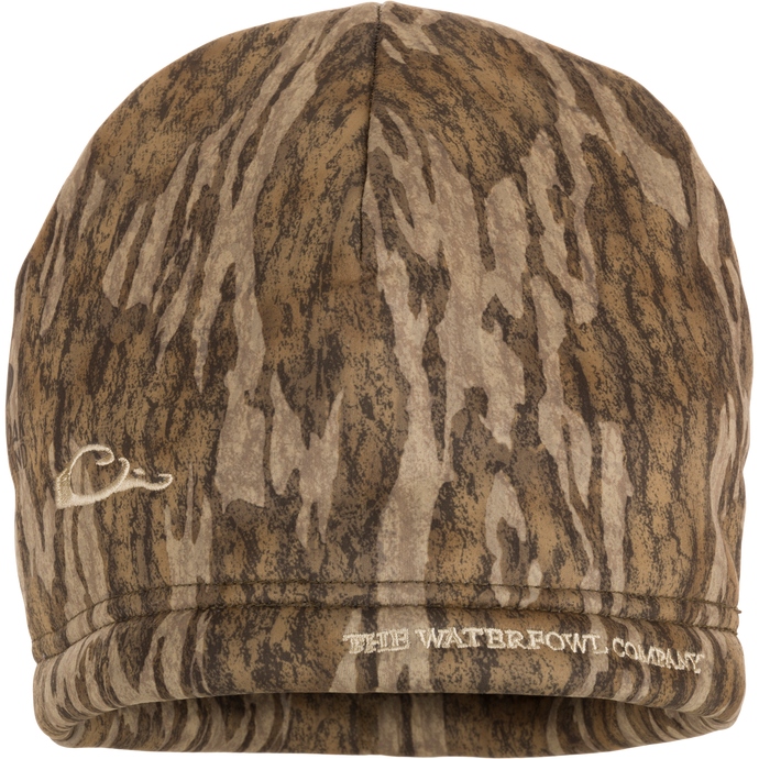 The Waterfowl Company Softshell Sherpa Beanie with logo, made of 100% polyester and Sherpa fleece lining, ideal for outdoor activities.