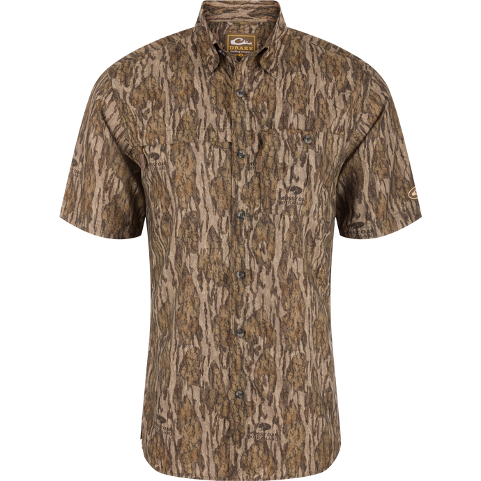 Short-Sleeved Flyweight Camo Hunting Shirt with tree pattern, vented cape back, hidden button-down collar, and multiple zippered chest pockets for functional hunting wear.