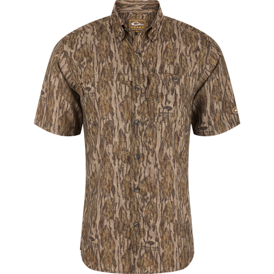 Short-Sleeved Flyweight Camo Hunting Shirt with tree pattern, vented cape back, hidden button-down collar, and multiple zippered chest pockets for functional hunting wear.