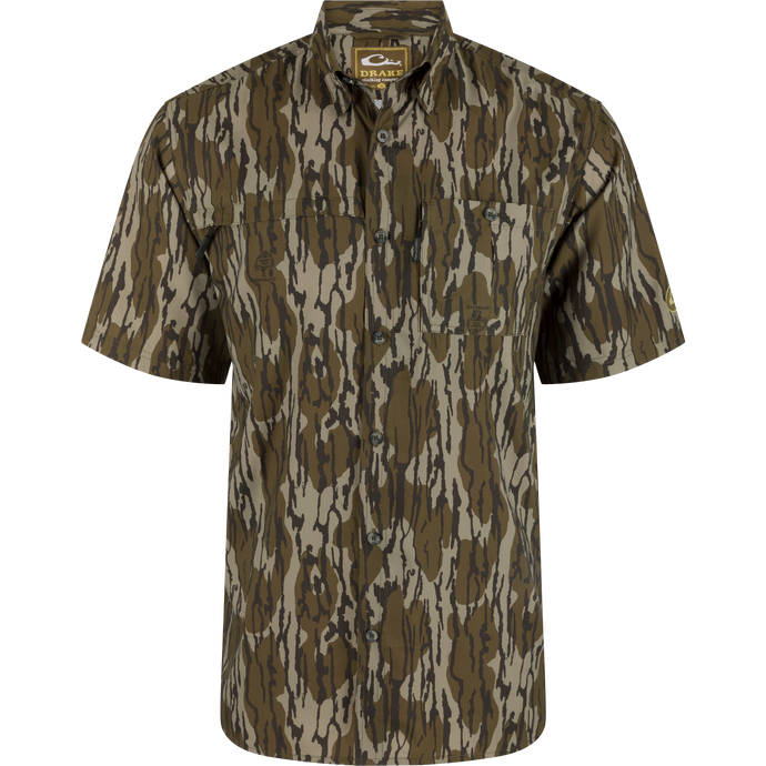 Alt text: Camouflage Flyweight Short Sleeve Shirt on a mannequin, featuring a vented cape back and hidden zippers on both chest pockets.