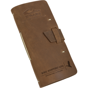 A brown leather case with a buckle, perfect for capturing every detail of your bird hunts. Drake Leather Bird Hunting Log.