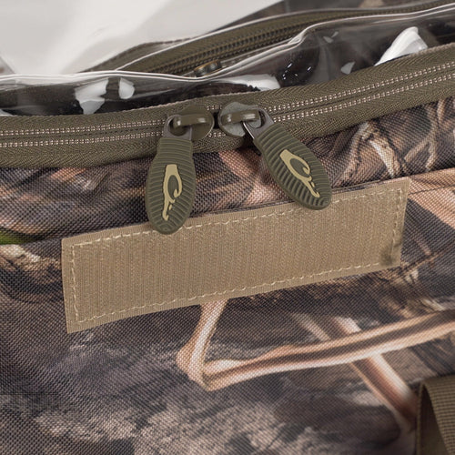 Floating Blind Bag 2.0 - Large: A close-up of zippers on a bag, showcasing the innovative design for outdoor enthusiasts.