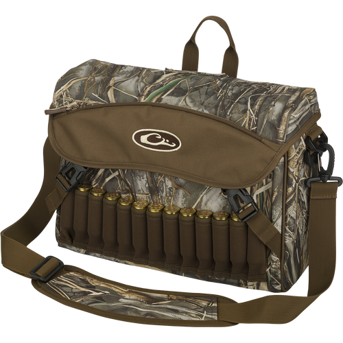 Shoulder Bag 2.0 - Realtree Max-7 featuring an adjustable strap, multiple storage pockets, neoprene shell loops, and interior choke tube sleeves, displayed with illustrative shotgun shells.