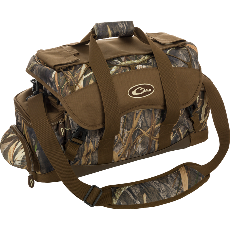 Extra Large Blind Bag with camouflage design, multiple straps, and 20 organizational pockets, including waterproof compartments and adjustable shoulder strap for hunting gear.