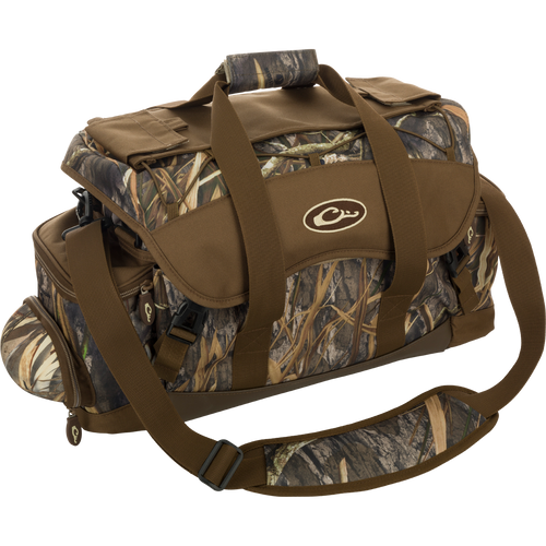 Extra Large Blind Bag with camouflage design, multiple straps, and 20 organizational pockets, including waterproof compartments and adjustable shoulder strap for hunting gear.