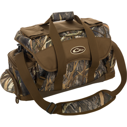 Extra Large Blind Bag with camouflage design, multiple straps, and 20 organizational pockets, including waterproof compartments and adjustable shoulder strap for hunting gear.