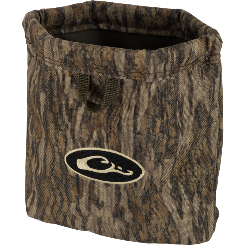 Waterfowler's Shell Bag with logo, featuring durable metal spring-open closure, front and rear webbing loops for grip and hanging, and corrosion-resistant brass grommets for drainage.