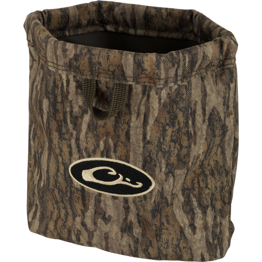 Waterfowler's Shell Bag with logo, featuring durable metal spring-open closure, front and rear webbing loops for grip and hanging, and corrosion-resistant brass grommets for drainage.