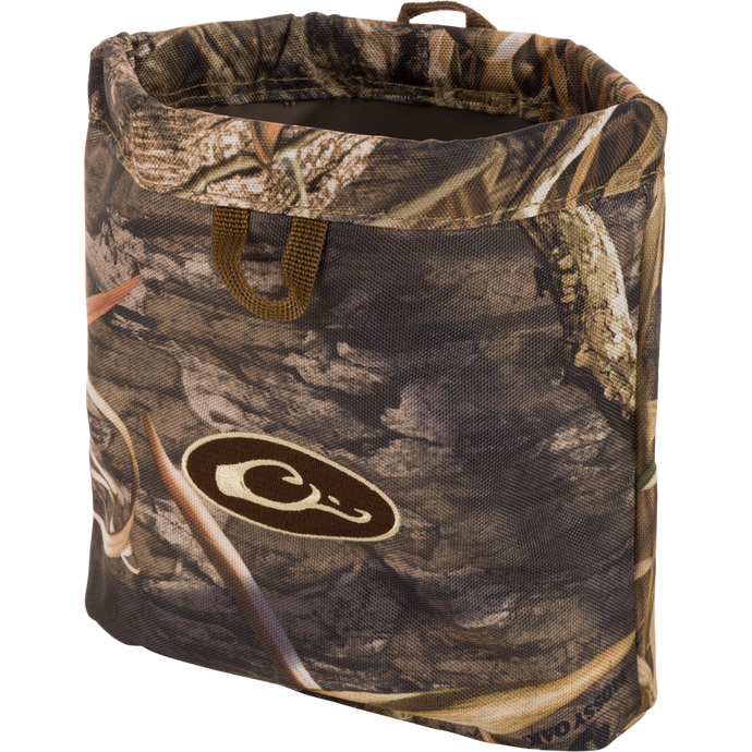Waterfowler's Shell Bag featuring a camouflage pattern, durable metal spring-open secure closure, front and rear webbing loops, and corrosion-resistant brass grommets.