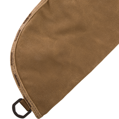 Close-up of the Wax Cotton Gun Sleeve, highlighting the wax canvas material, Velcro closure, and braided rope handle, designed for shotgun protection and easy transport.