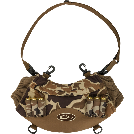 LST Handwarmer Muff - Old School with camouflage design, bullets, front storage pocket, phone pouch, and quick-release buckles for hunting.