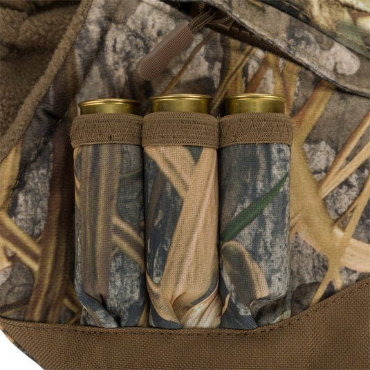 Close-up of the Drake LST Handwarmer Muff with front storage pocket and waterproof cell phone pouch, designed for windproof and water-resistant protection.