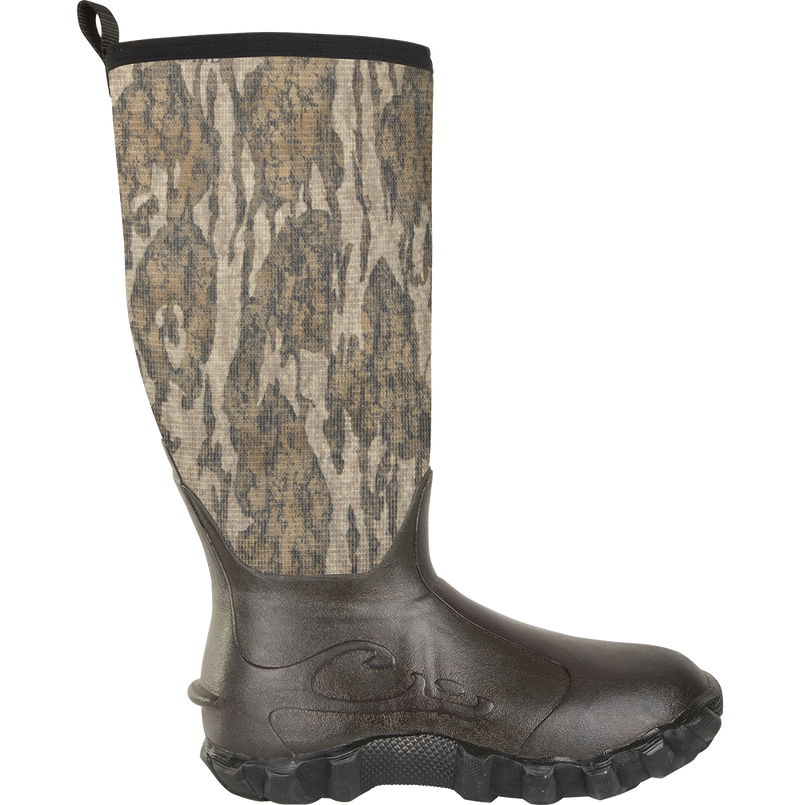 Knee High Mud Boot 2.0 for avid hunters and outdoorsmen. Features camouflage pattern, 6mm neoprene uppers, Buckshot Mud soles for traction. Ideal for all-day hunts. From Drake Waterfowl.
