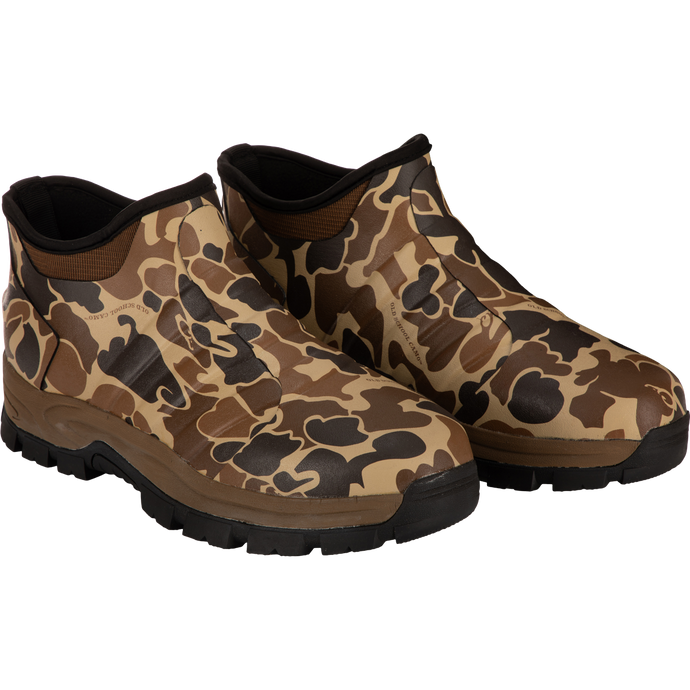 Alt text: 6 inch Uninsulated Camp Boot with camouflage design, featuring neoprene liner socks and athletic tread for comfort and traction.