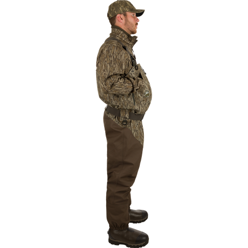 Uninsulated Guardian Elite HND Front Zip Wader - Original Treestand: A man in camouflage clothing wearing the Guardian Elite HND Front Zip Wader, featuring a close-up of a boot and a close-up of a man's face.