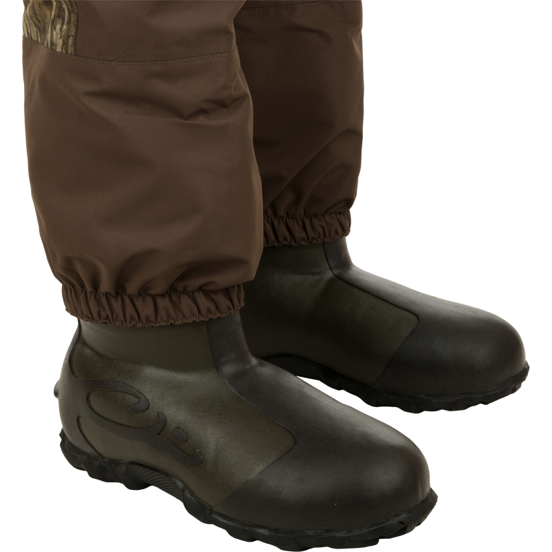 Insulated Guardian Elite Vanguard Breathable Wader - Old School, featuring 3-layer waterproof fabric, LokDown insulation, and 1600g Thinsulate boots. Ideal for hunting and fishing adventures.