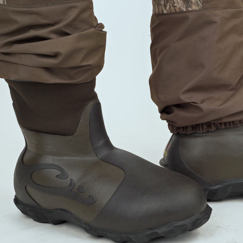 Guardian Elite Front Zip Insulated Wader with robust TIZIP® MasterSeal zipper, featuring 1200g Thinsulate Buckshot Mudder Boots, ideal for hunting in extreme conditions.