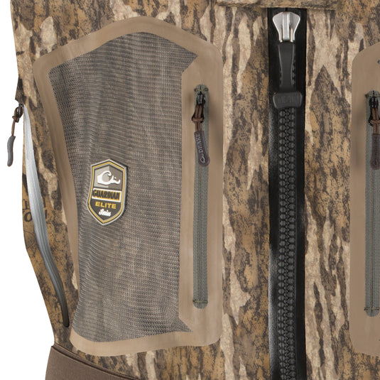 Close-up of the Guardian Elite Front Zip Insulated Wader, highlighting a durable TIZIP® MasterSeal 10 waterproof zipper and robust construction for hunting durability.