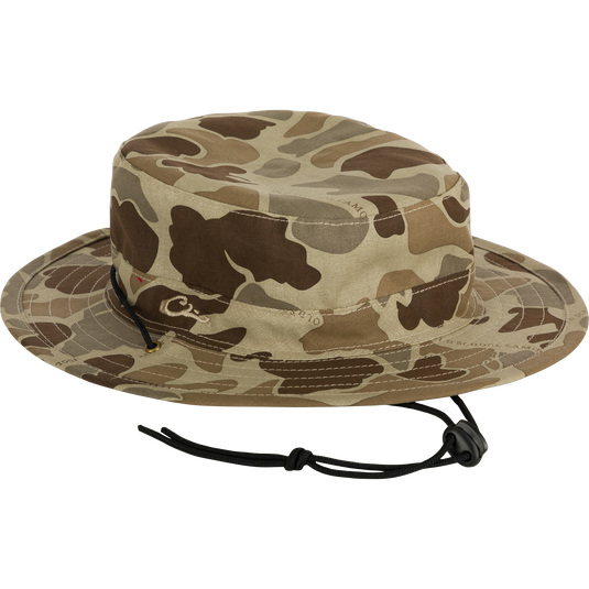 Camouflage DUK Boonie Hat with adjustable drawstring and full brim for all-weather protection and concealment; made of 100% cotton for a classic look.