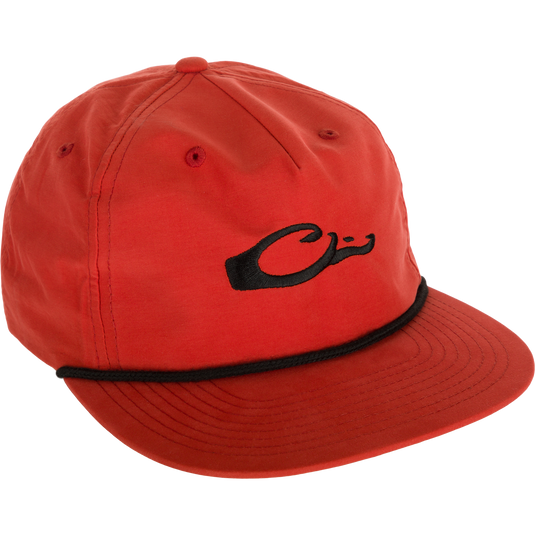 Drake Logo Rope Cap, a low-profile red hat with black logo, flat bill, adjustable snap-back closure, and breathable cotton/nylon fabric for sun protection.