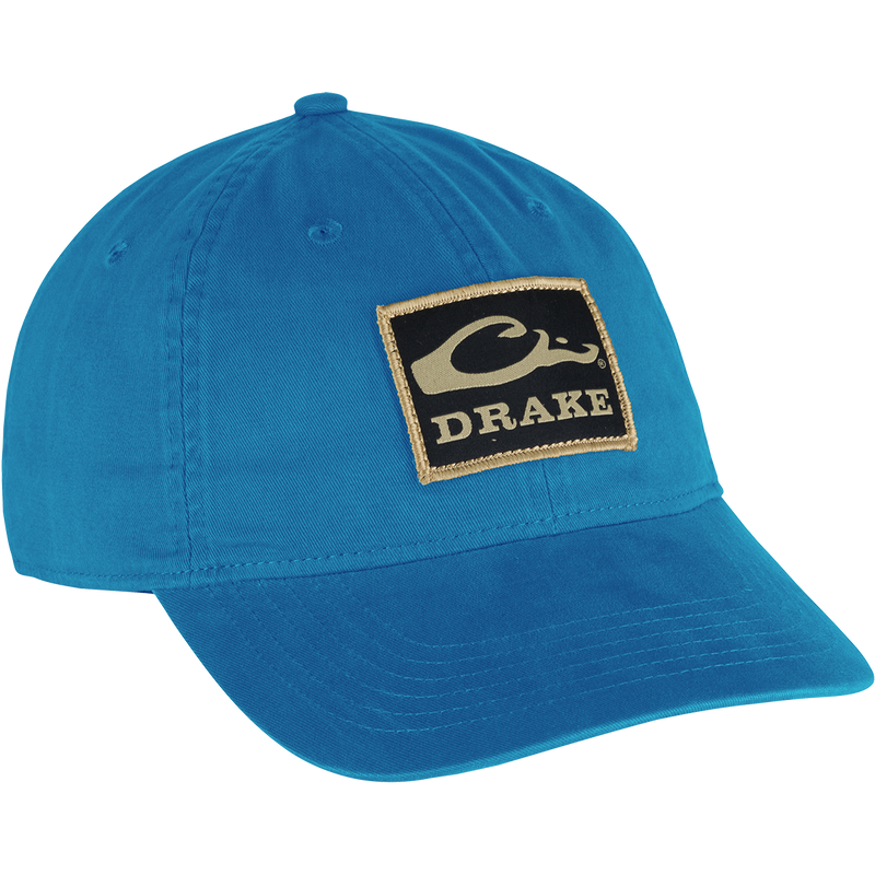 Cotton Twill Patch Cap with logo, low profile, contoured bill, and brass buckle back strap for a comfortable fit.