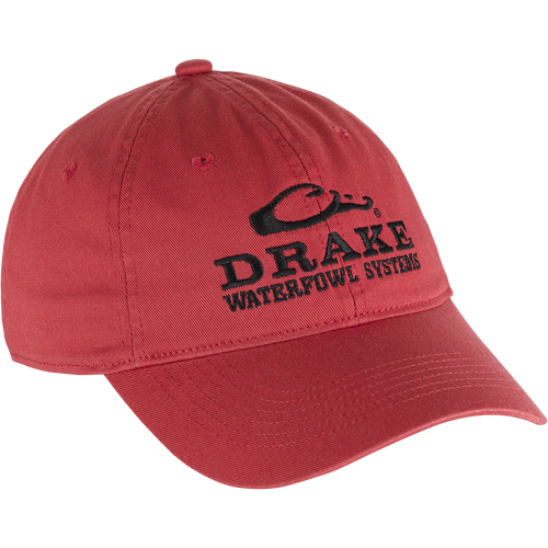 Cotton Twill Systems Cap featuring black text, low-profile design, contoured bill, and brass buckle backstrap, ideal for stylish, comfortable outdoor wear.