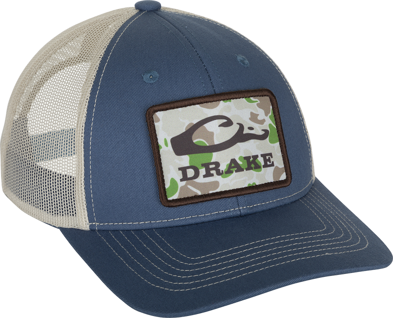 Old School Patch Mesh Back Cap with a structured crown, mesh back, and adjustable snap-back closure, featuring a prominent patch.