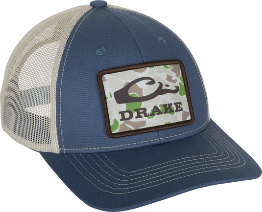 Old School Patch Mesh Back Cap with a structured crown, mesh back, and adjustable snap-back closure, featuring a prominent patch.