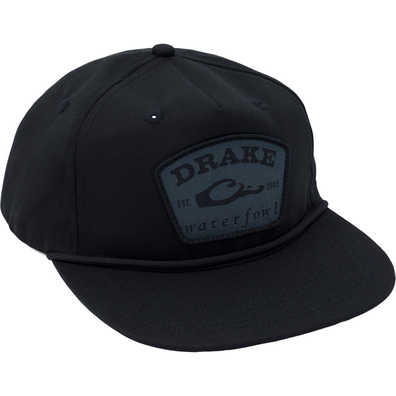 Drake X Lost Hat Drake Patch Goat Rope Cap featuring a logo, adjustable snap-back closure, flat bill, and 550 Paracord detailing.