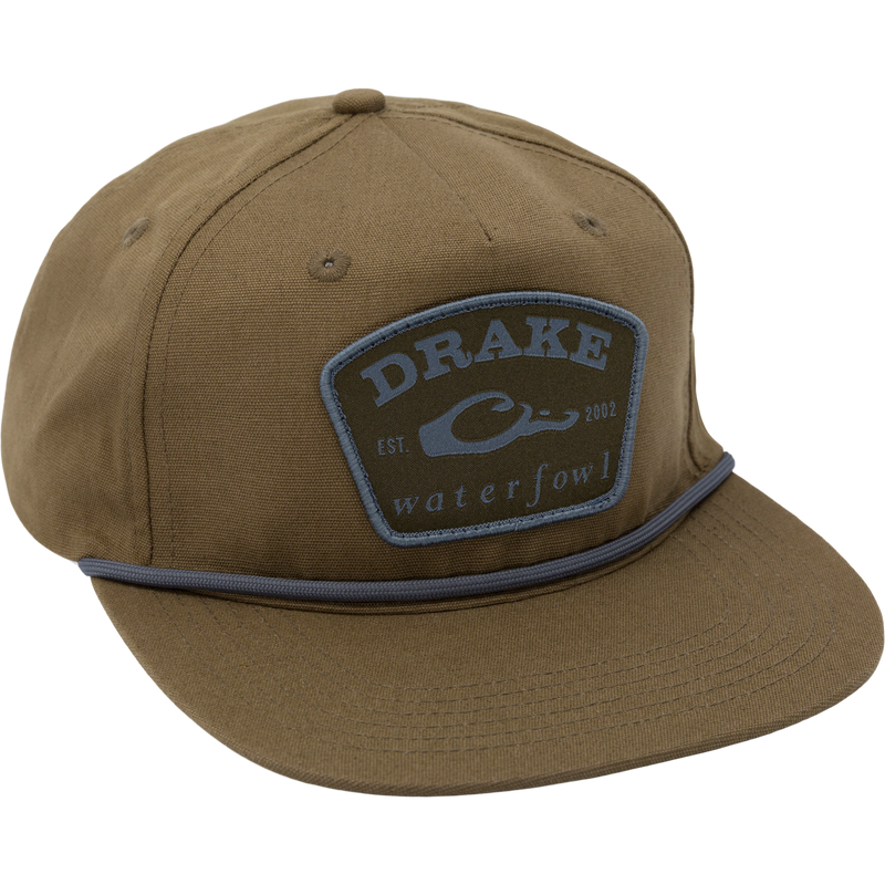 Drake X Lost Hat Drake Patch Goat Rope Cap featuring a logo patch, unstructured design, flat visor, and adjustable snap-back closure for a custom fit.