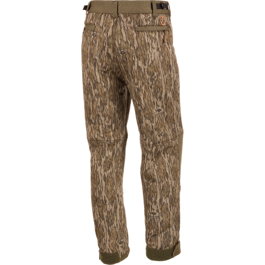 Alt text: Youth Silencer Pant With Agion Active XL, camouflage design with multiple pockets, adjustable waist and ankle, ideal for quiet and comfortable deer stand hunting.