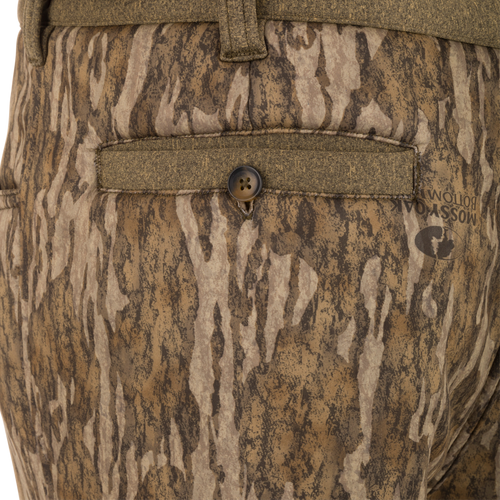 Close-up of Youth Silencer Pant With Agion Active XL, highlighting the ultra-quiet soft-shell fabric and button detail, designed for hunting comfort and scent control.