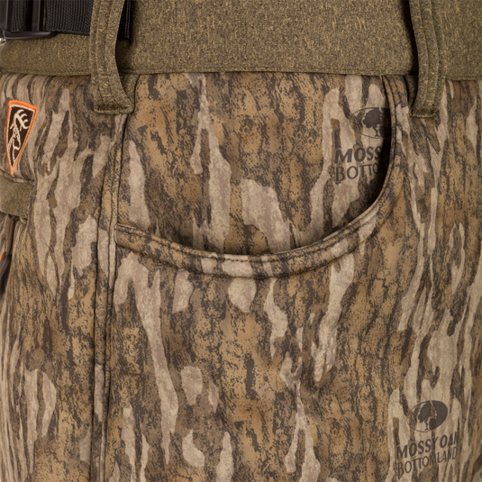 Close-up of a Youth Silencer Pant pocket with Agion Active XL scent control, showcasing ultra-quiet soft-shell fabric and micro-fleece lining.