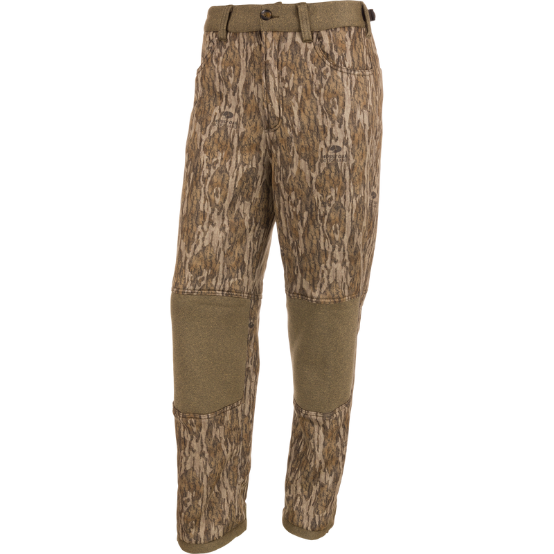 Youth Silencer Pant with Agion Active XL, camouflage pattern, featuring adjustable waist, front and rear pockets, and elastic foot stirrups for hunting comfort and scent control.