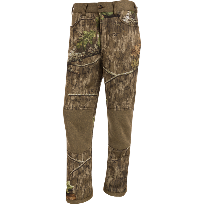 Silencer Soft Shell Pant with Agion Active XL, featuring camouflage fabric, elastic foot stirrups, adjustable waist, and multiple pockets for hunting comfort and scent control.