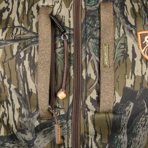 Silencer Full Zip Jacket with scent control, featuring close-up of durable zippers and soft polyester fabric, ideal for big game hunting.