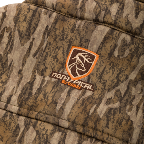 Close-up of the Youth Silencer Full Zip Jacket Full Camo with Scent Control, highlighting the durable camouflage fabric and visible chest pocket zipper.