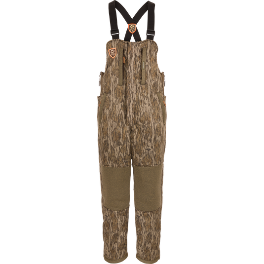 Women’s Silencer Bib With Agion Active XL, featuring camouflage overalls with adjustable straps, multiple pockets, and scent control technology, ideal for mid-season hunting.