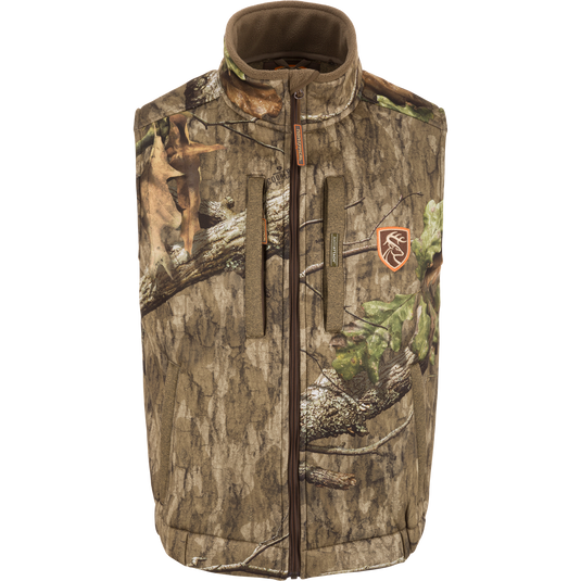 Alt text: Silencer Vest with Agion Active XL featuring camouflage design, vertical zippered chest pocket, and lower zipped pockets, ideal for hunting.