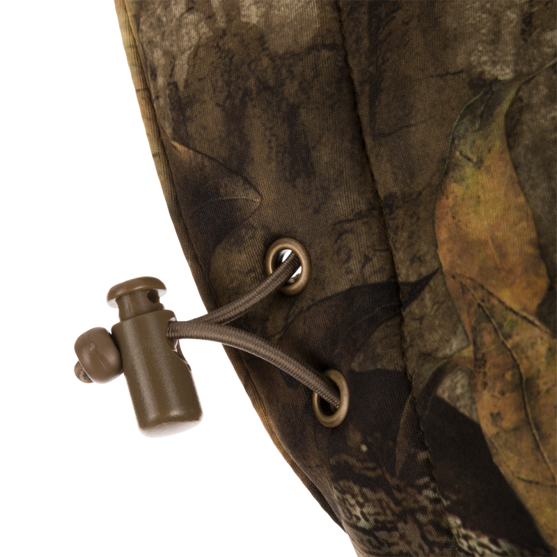 Close-up of the Stand Hunter's Silencer Jacket with Scent Control, highlighting the durable zipper and soft, quiet outer fabric designed for late-season hunting.