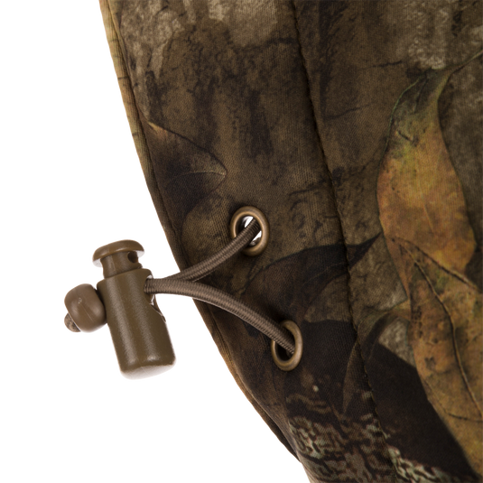 Close-up of the Stand Hunter's Silencer Jacket with Scent Control, highlighting the durable zipper and soft, quiet outer fabric designed for late-season hunting.